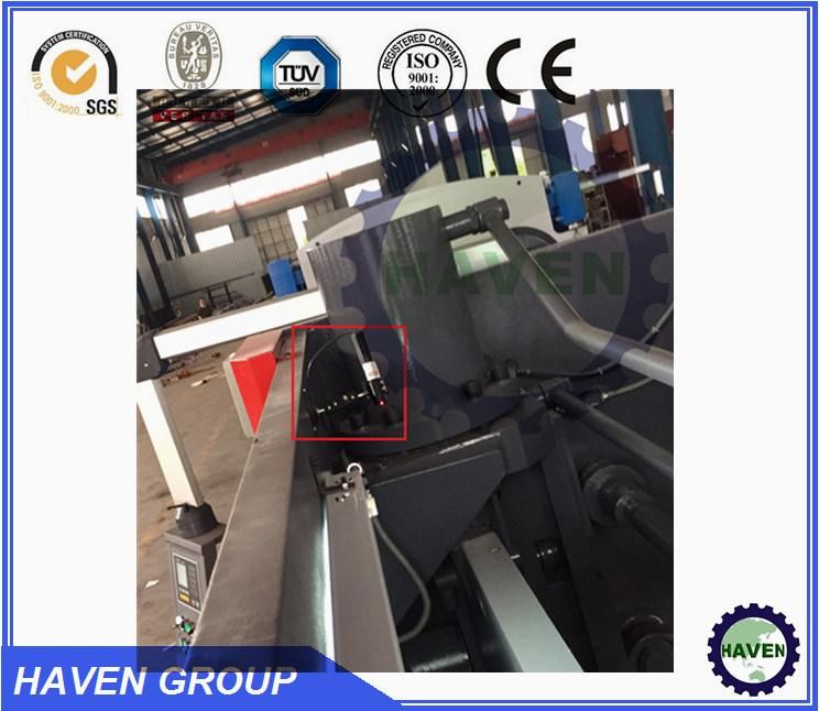 Hydraulic swing beam shear